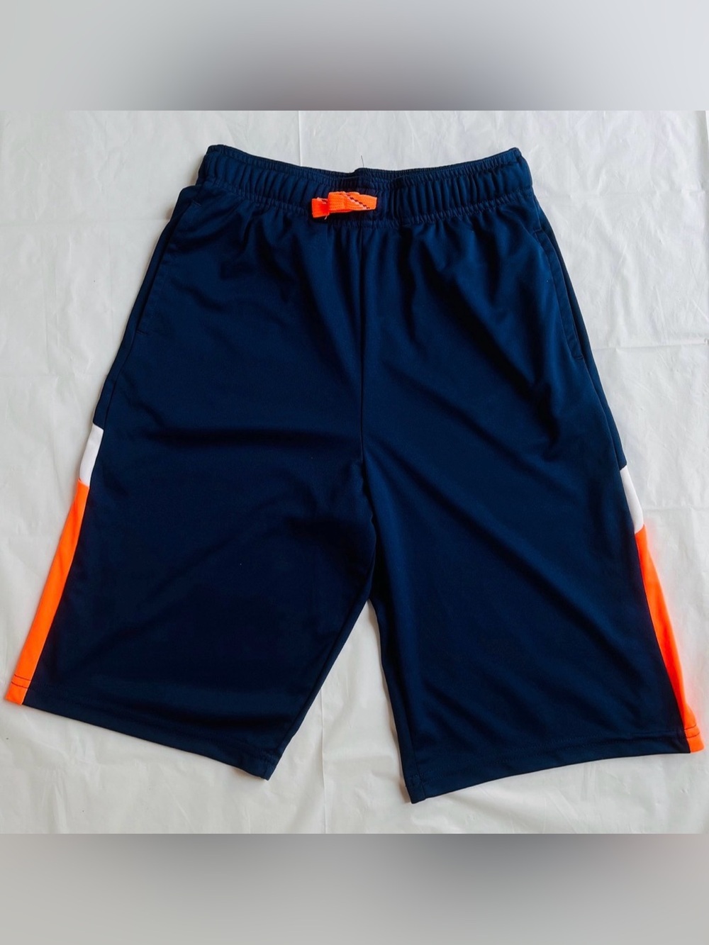 Jumping Beans polyester shorts size 12/side pockets/inseam 10”/ orange accents